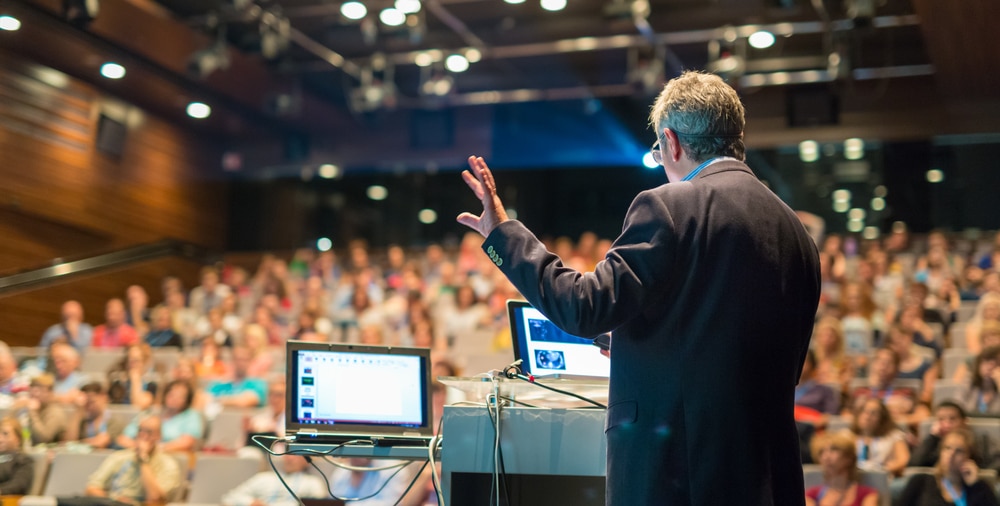 man lecturing to audience