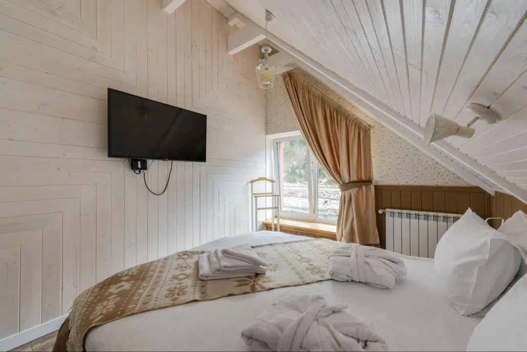 cozy bedroom with slanted ceiling