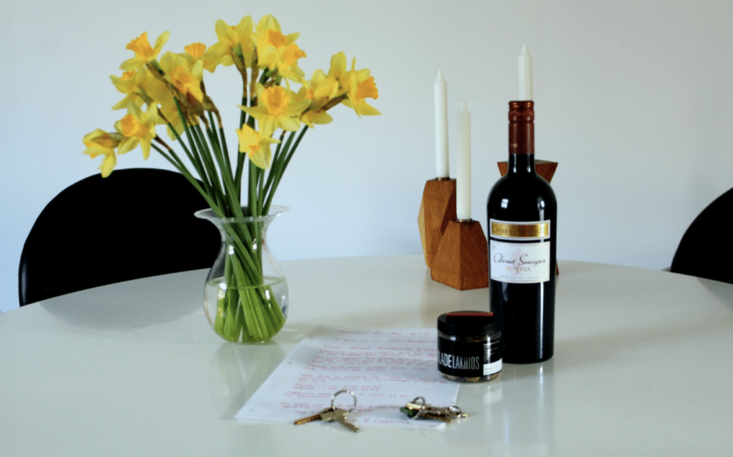 welcome gift of wine, flowers and keys