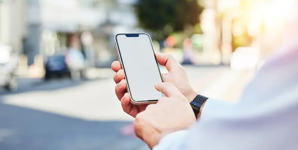 man on smartphone outdoors