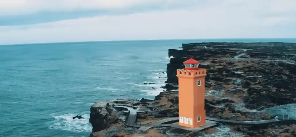 Lighthouse next to ocean in Iceland 